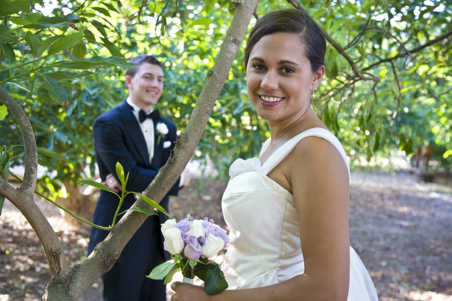 Bride and groom among the trees